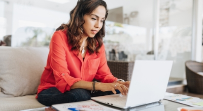 a business person accessing tools on laptop